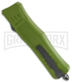 Atomic Defender Mini OTF Automatic Knife OD Green - Serr Two Tone Dagger -Grindworx Atomic Defender OD Green OTF Auto Dagger TT Serr GX 36393 jr side large