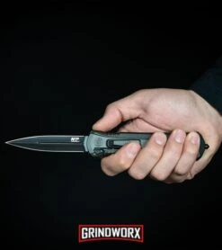 Smith & Wesson Spring Assisted Finger Actuator Spear Point OTF - Black Serr -Grindworx MP OTF Spring Assisted Spear Point Knife Gray Black BHQ 80731 kp in hand web large 1